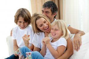 bigstock_happy_family_relaxing_on_the_s_6558303-happy-family 3